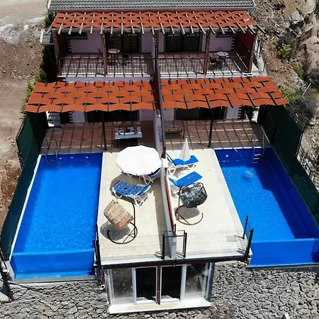 Vera Faralya Kirme Deniz Manzarali Korunakli Balayi Villasi Fethiye